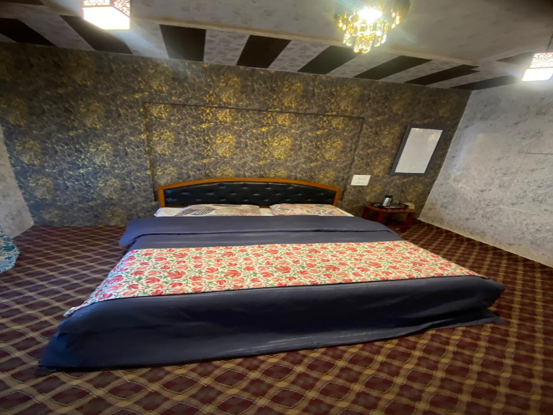 Deluxe Lake View Room interior at Lake House Palace (by J.V Resort)