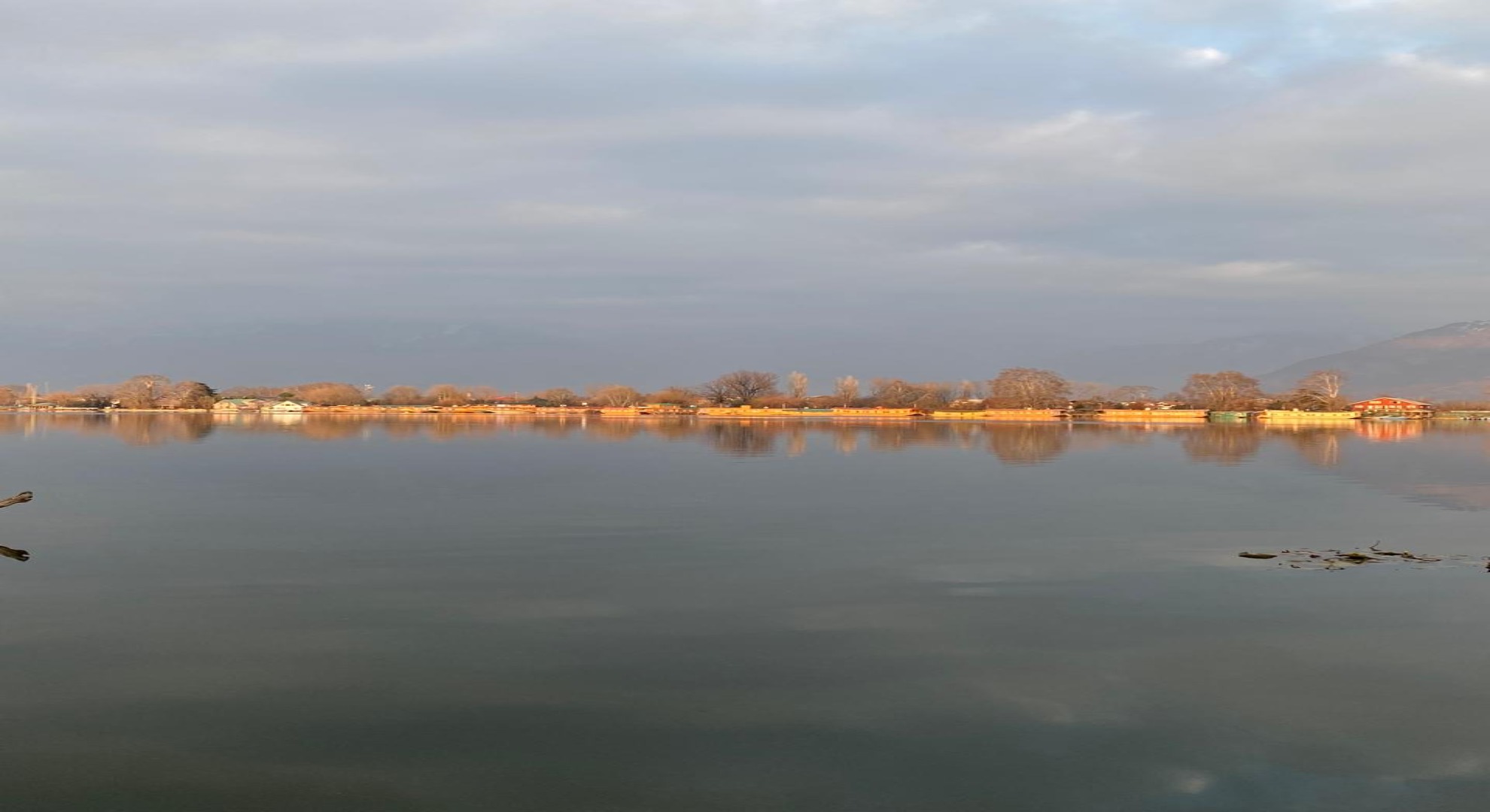Tranquil view from Lake House Palace overlooking Nigeen Lake